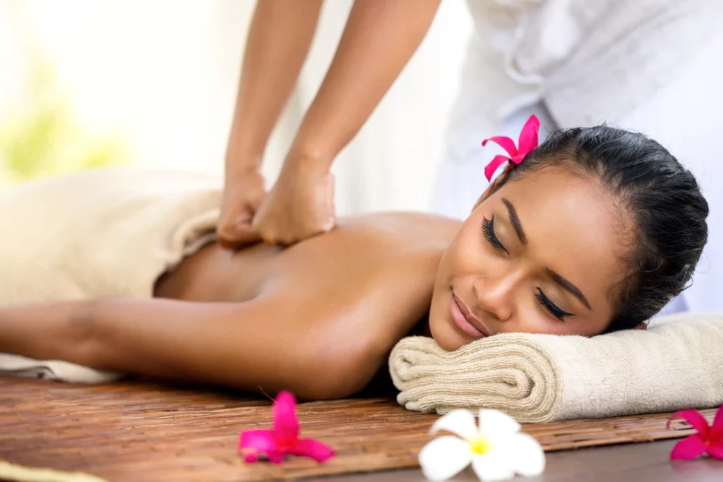 Best Spa in Bangalore for Stress Relief and Body Rejuvenation with expert therapist providing relaxing back massage in a luxury spa setting