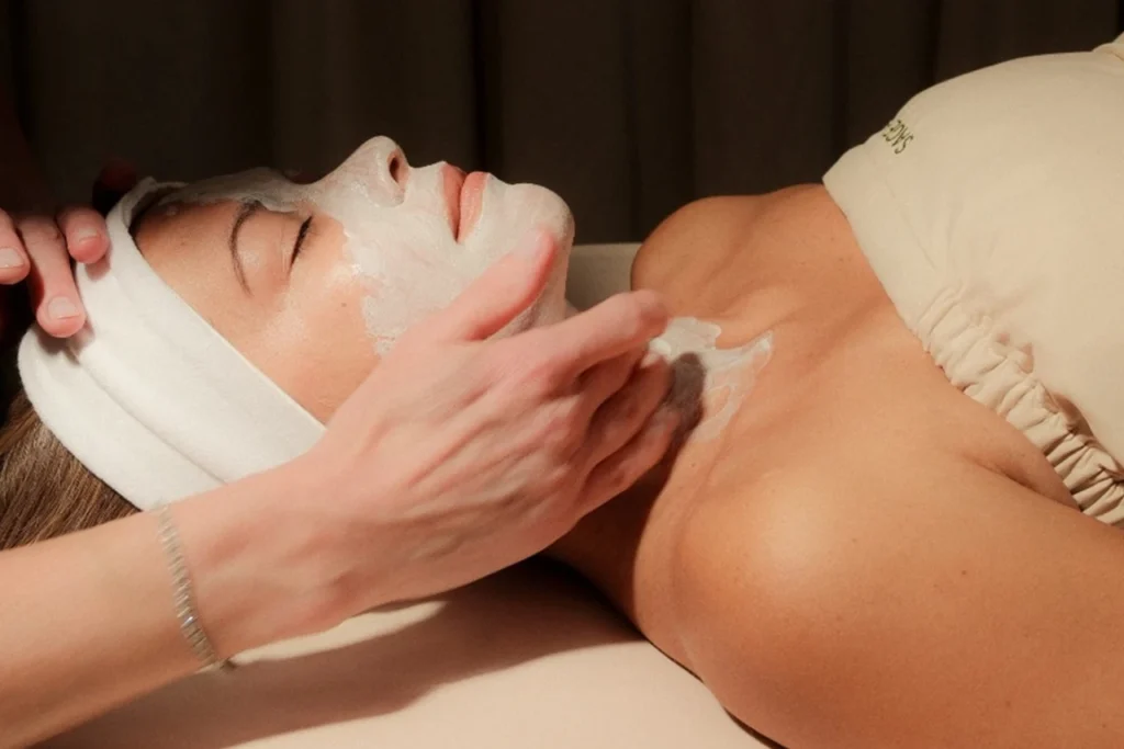 Best Spa in Bangalore for Stress Relief and Body Rejuvenation with expert therapist providing relaxing facial treatment in a luxury spa setting